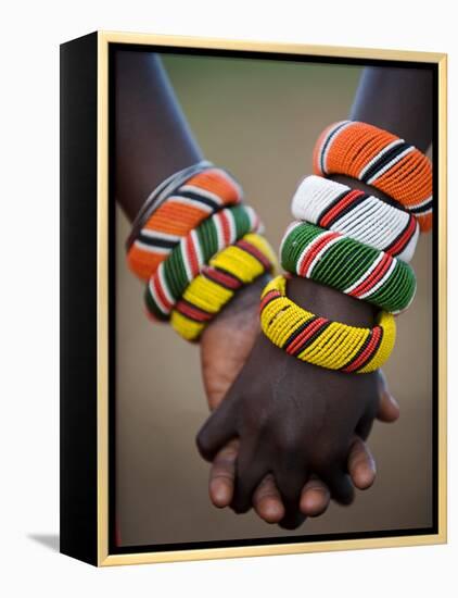 Kenya, Laikipia, Ol Malo; a Samburu Boy and Girl Hold Hands at a Dance in their Local Manyatta-John Warburton-lee-Framed Premier Image Canvas