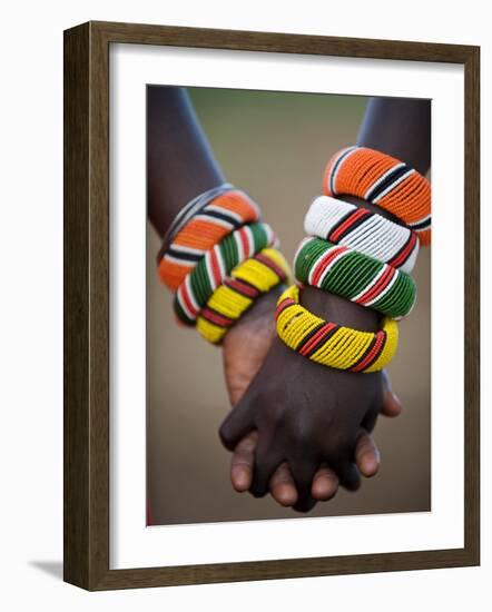 Kenya, Laikipia, Ol Malo; a Samburu Boy and Girl Hold Hands at a Dance in their Local Manyatta-John Warburton-lee-Framed Photographic Print