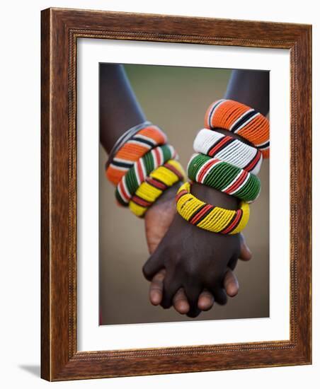 Kenya, Laikipia, Ol Malo; a Samburu Boy and Girl Hold Hands at a Dance in their Local Manyatta-John Warburton-lee-Framed Photographic Print