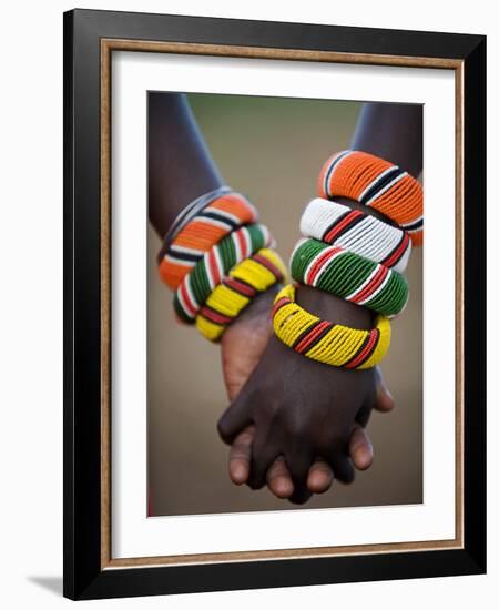 Kenya, Laikipia, Ol Malo; a Samburu Boy and Girl Hold Hands at a Dance in their Local Manyatta-John Warburton-lee-Framed Photographic Print