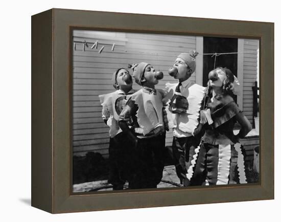 Kids Biting Apples on Strings at Halloween-null-Framed Stretched Canvas