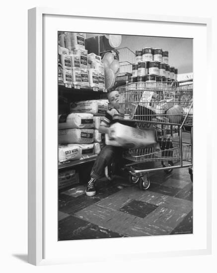 Kids in Supermarket, Experiment by Kroger Food Foundation, Children Let Loose in Kroger Supermarket-Francis Miller-Framed Photographic Print