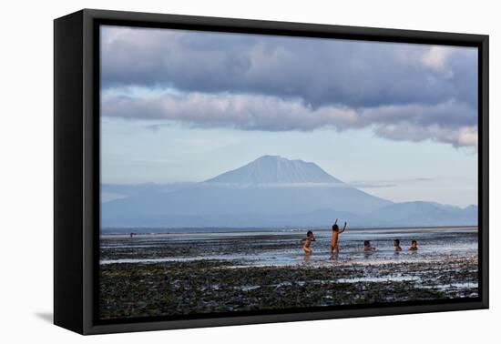 Kids Playing in the Water on the Coast of Bali-Alex Saberi-Framed Premier Image Canvas