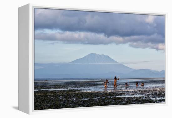 Kids Playing in the Water on the Coast of Bali-Alex Saberi-Framed Premier Image Canvas