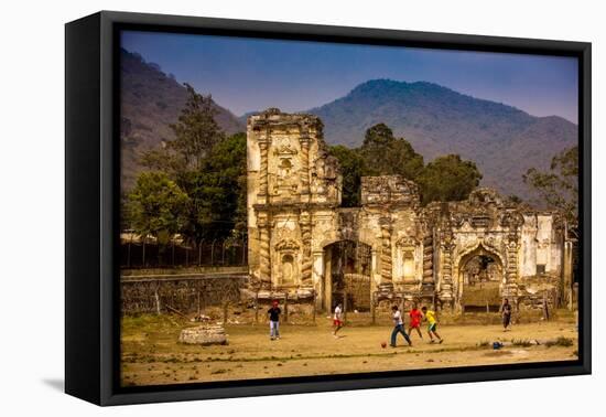 Kids Playing Soccer at Ruins in Antigua, Guatemala, Central America-Laura Grier-Framed Premier Image Canvas