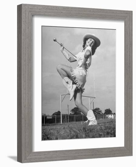 Kilgore Junior College Rangerette Marching with Her Baton-Joe Scherschel-Framed Photographic Print