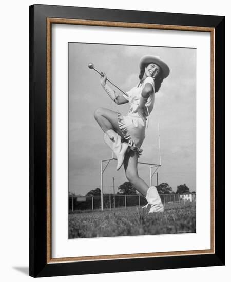 Kilgore Junior College Rangerette Marching with Her Baton-Joe Scherschel-Framed Photographic Print