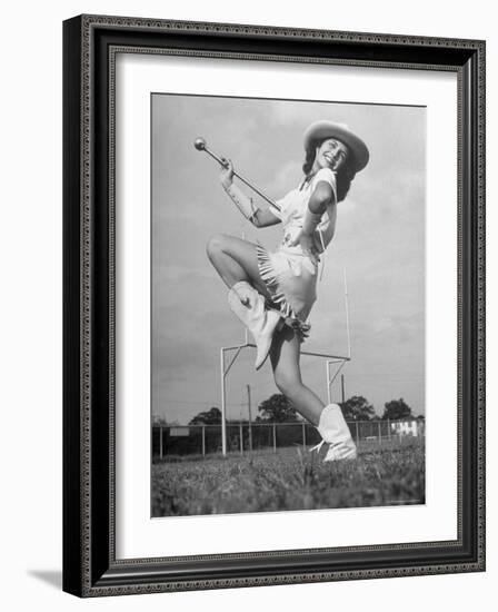 Kilgore Junior College Rangerette Marching with Her Baton-Joe Scherschel-Framed Photographic Print