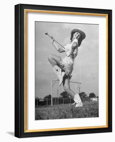 Kilgore Junior College Rangerette Marching with Her Baton-Joe Scherschel-Framed Photographic Print