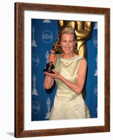 Kim Basinger Holding Her Oscar in Press Room at Academy Awards-Mirek Towski-Framed Premium Photographic Print