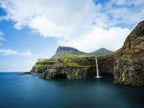 A Waterfall Cascading over the Black Sand Beach of Bour into the Sorvagsfjorour, Vagar Island, Faro-Kimberley Coole-Photographic Print