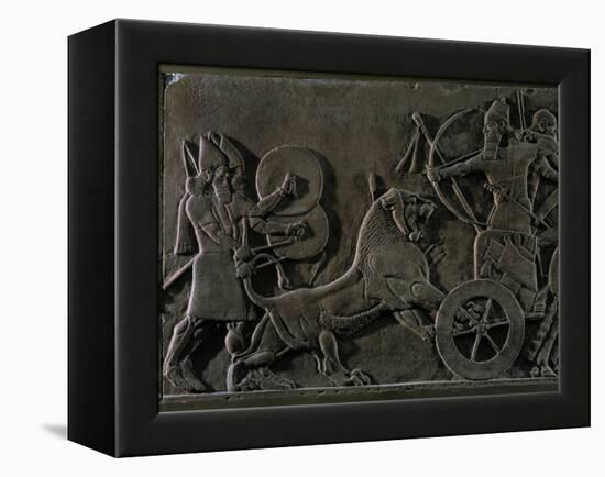 King Ashurnazirpal Hunting Lions, a Lion Leaping at the King's Chariot-null-Framed Premier Image Canvas