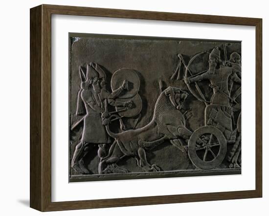 King Ashurnazirpal Hunting Lions, a Lion Leaping at the King's Chariot-null-Framed Giclee Print