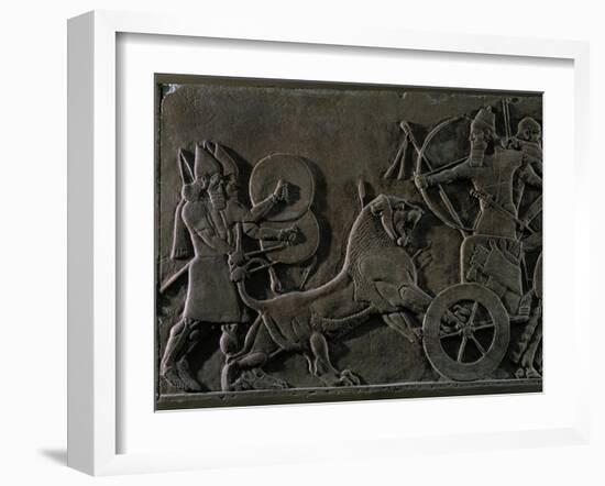 King Ashurnazirpal Hunting Lions, a Lion Leaping at the King's Chariot-null-Framed Giclee Print
