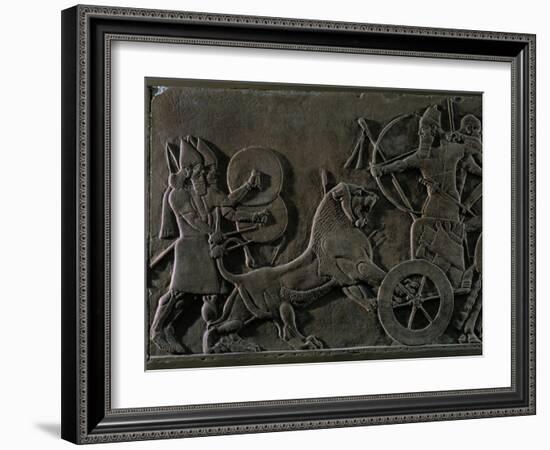 King Ashurnazirpal Hunting Lions, a Lion Leaping at the King's Chariot-null-Framed Giclee Print