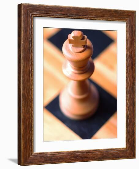 King chess piece on chessboard-null-Framed Photographic Print