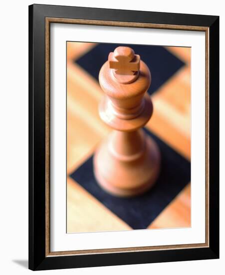 King chess piece on chessboard-null-Framed Photographic Print