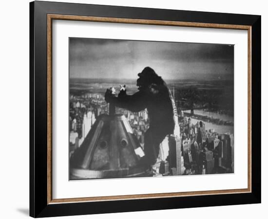 King Kong Clinging to Top of Empire State Building Tower in Horror Movie with Fay Wray in His Hands-Alfred Eisenstaedt-Framed Photographic Print