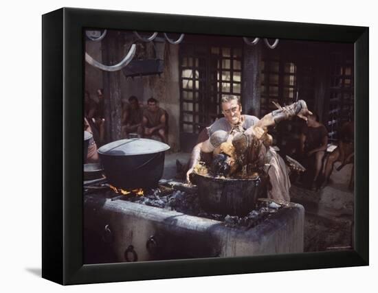 Kirk Douglas Dunking Enemy's Head in Giant Cook Pot in Scene From Stanley Kubrick's "Spartacus"-J^ R^ Eyerman-Framed Premier Image Canvas