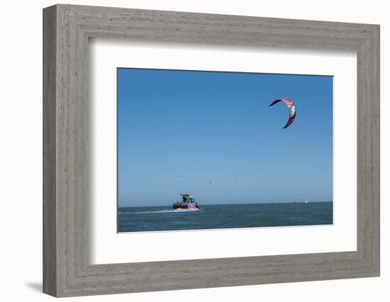 Kitesurfer and tourist boat in Exe Estuary, Devon-Charles Bowman-Framed Photographic Print