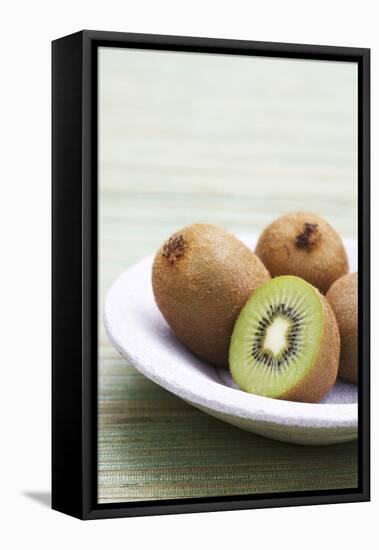 Kiwi Fruits, Whole and Halved-Jo Kirchherr-Framed Premier Image Canvas