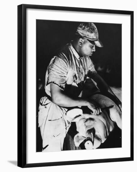 Knife-Wielding Butcher About to Cut Up Dead Pig at Swift Meat Packing Packington Plant-Margaret Bourke-White-Framed Premium Photographic Print
