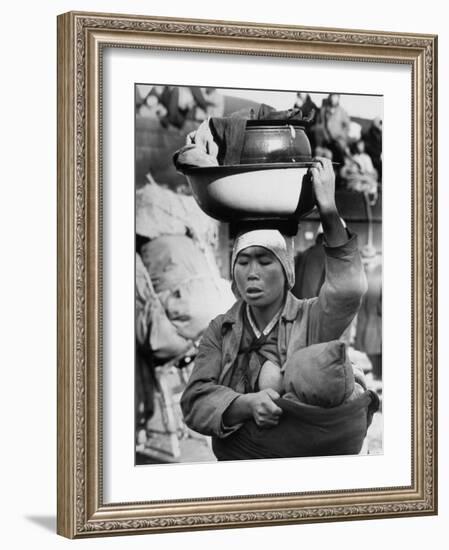 Korean Mother Nursing Her Baby, Carrying All Her Belongings in a Wash Basin, Retreating from Seoul-Carl Mydans-Framed Photographic Print