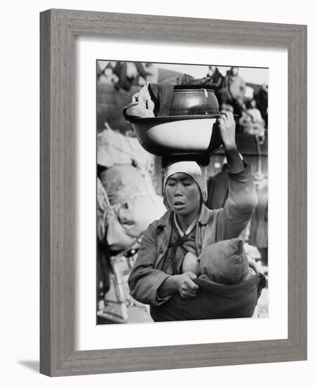 Korean Mother Nursing Her Baby, Carrying All Her Belongings in a Wash Basin, Retreating from Seoul-Carl Mydans-Framed Photographic Print