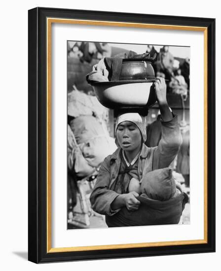 Korean Mother Nursing Her Baby, Carrying All Her Belongings in a Wash Basin, Retreating from Seoul-Carl Mydans-Framed Photographic Print