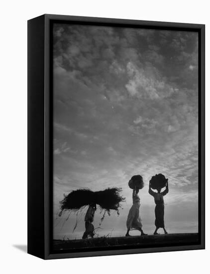 Korean Peasants Carrying Bundles on Their Heads-Michael Rougier-Framed Premier Image Canvas