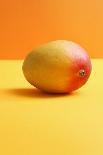 Mango on Coloured Background-Kr?ger and Gross-Photographic Print