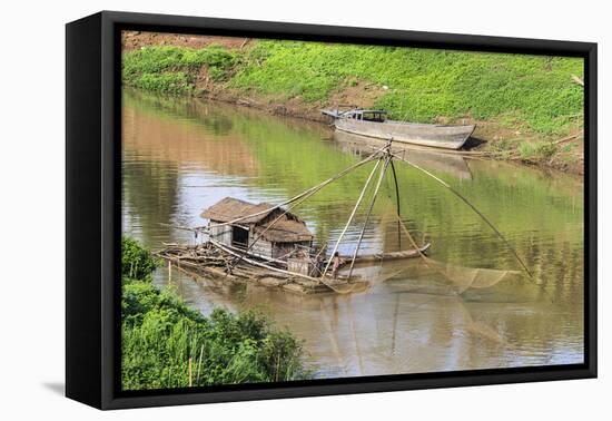 Kratie, Cambodia. Floating Vietnamese houseboat on the Mekong River in Kratie, Cambodia.-Yvette Cardozo-Framed Premier Image Canvas