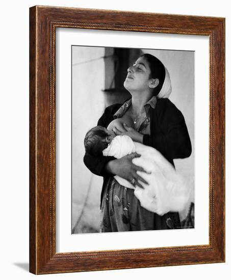 Kurdi Mother, One of the Most Primitive Tribes of Israel, Nursing Child in Mountain Colony-Paul Schutzer-Framed Photographic Print