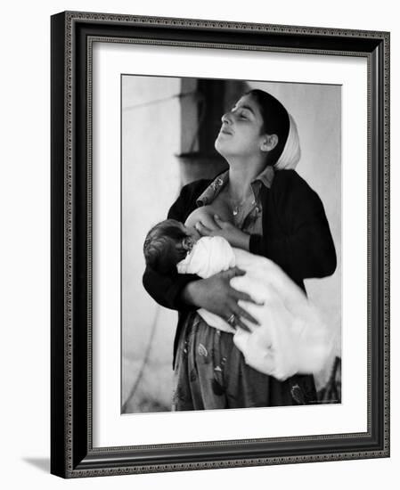 Kurdi Mother, One of the Most Primitive Tribes of Israel, Nursing Child in Mountain Colony-Paul Schutzer-Framed Photographic Print