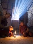 Two Novice Monks Reading Buddhist Texts Inside a Pagoda at Bagan in the Country of Burma (Myanmar)-Kyle Hammons-Photographic Print