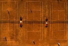 Aerial Shot of a Tennis Courts with Players in Warm Evening Sunlight-l i g h t p o e t-Framed Photographic Print