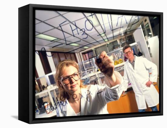 Laboratory Chemist Writes a Chemical Formula-Tek Image-Framed Premier Image Canvas
