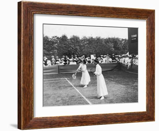 Ladies' Doubles Match at Wimbledon-null-Framed Photographic Print