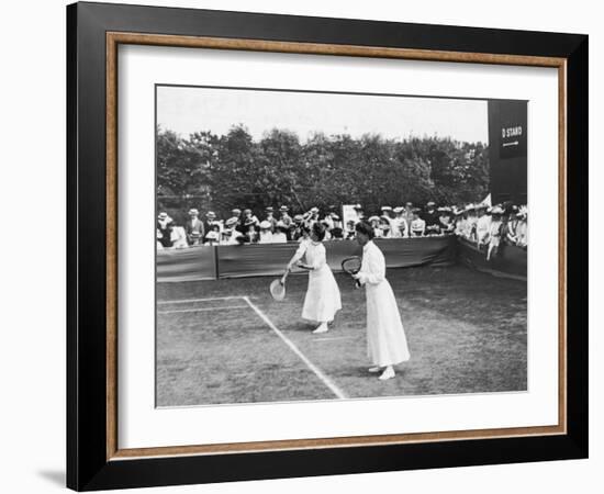 Ladies' Doubles Match at Wimbledon-null-Framed Photographic Print