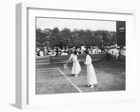 Ladies' Doubles Match at Wimbledon-null-Framed Photographic Print