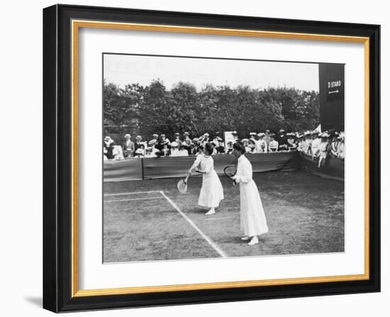 Ladies' Doubles Match at Wimbledon-null-Framed Photographic Print