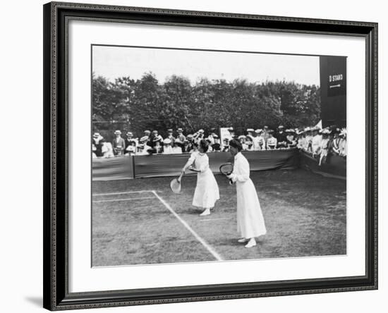 Ladies' Doubles Match at Wimbledon-null-Framed Photographic Print