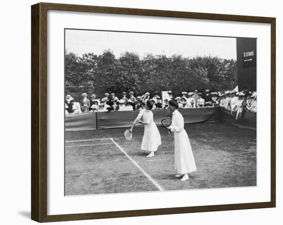 Ladies' Doubles Match at Wimbledon-null-Framed Photographic Print