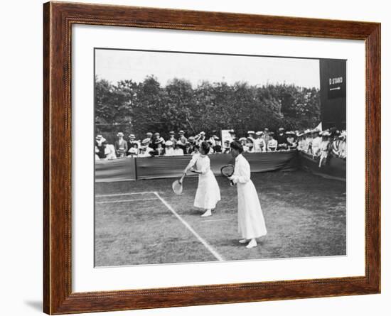 Ladies' Doubles Match at Wimbledon-null-Framed Photographic Print