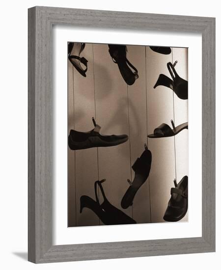 Ladies Shoes Hanging on Wire-Henry Horenstein-Framed Photographic Print