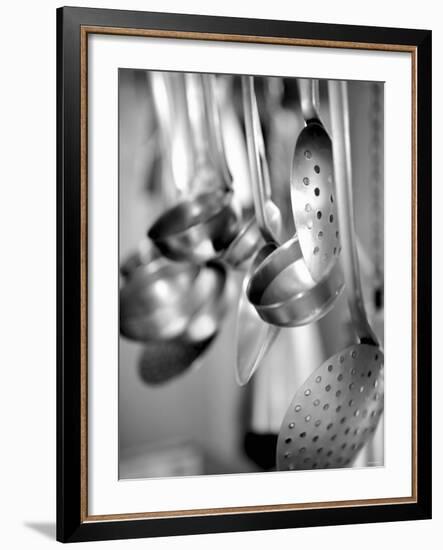 Ladles and Slotted Spoons Hanging up in a Kitchen-Huw Jones-Framed Photographic Print