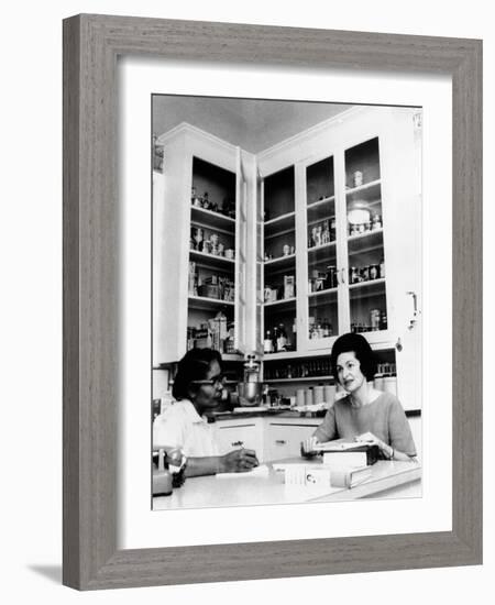 Lady Bird Johnson, in the Kitchen with Her African American Cook, Zephyr Wright-null-Framed Photo