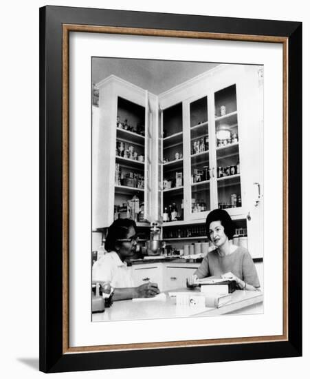 Lady Bird Johnson, in the Kitchen with Her African American Cook, Zephyr Wright-null-Framed Photo