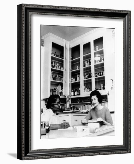 Lady Bird Johnson, in the Kitchen with Her African American Cook, Zephyr Wright-null-Framed Photo