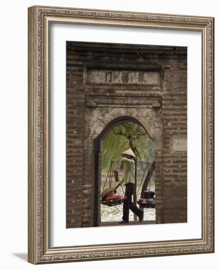 Lady Carrying Baskets, Hoan Kiem Lake, Hanoi, Northern Vietnam, Southeast Asia-Christian Kober-Framed Photographic Print